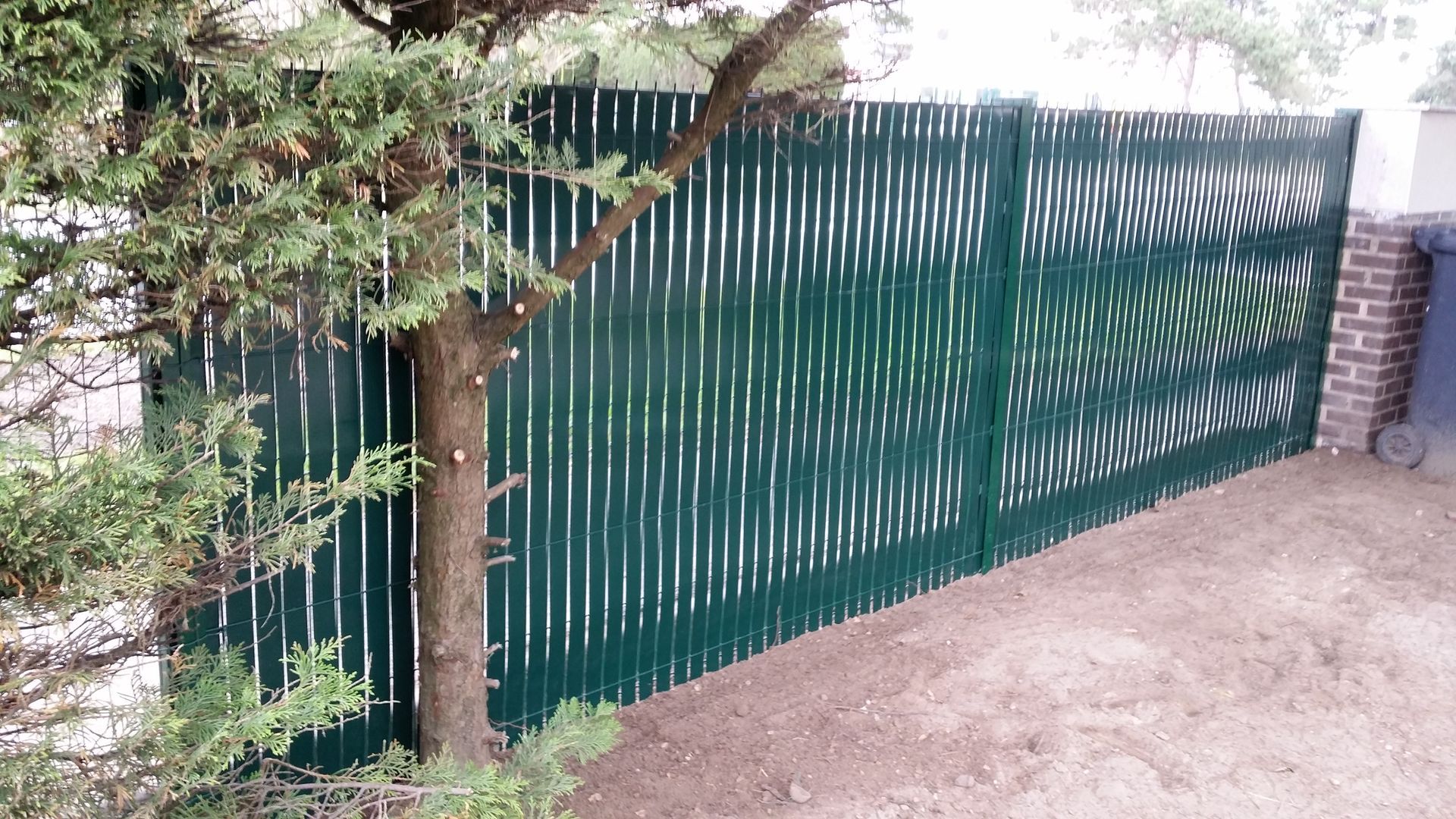 Grillage avec palissade