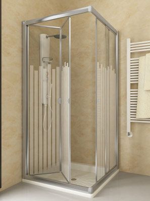 Un baño con cabina de ducha y toallero.
