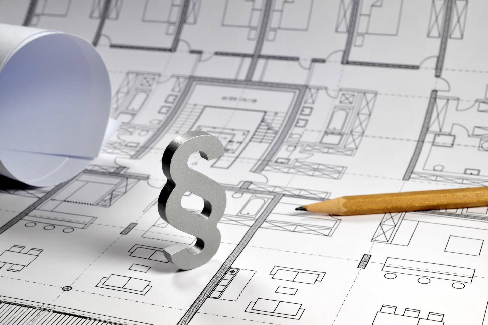 Bild zu Rechtsgebieten, Grundriss eines Hauses und das zeichen für Recht neben einem Stift