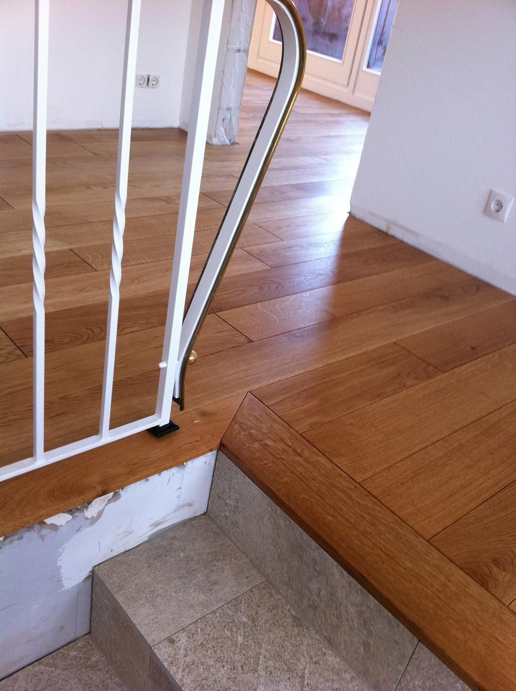 Parkett am Treppengeländer