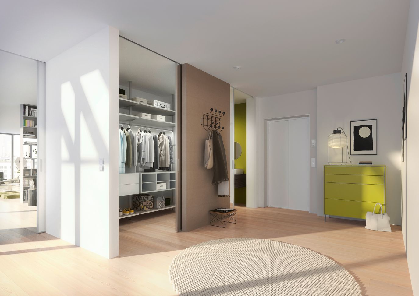 In der Mitte des Zimmers befindet sich ein begehbarer Kleiderschrank. Raumplus Wohntrend NRW