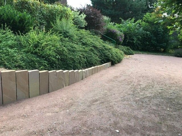 Mur de soutènement en palissades en grès