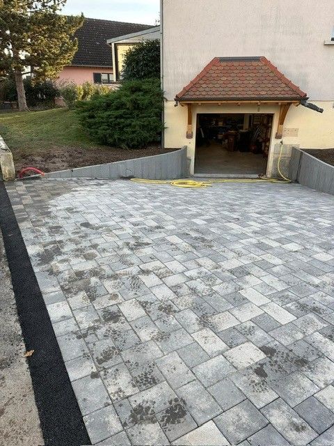 Pavage avec palissade en granit