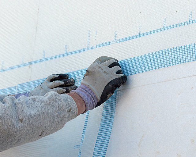 Travaux d'isolation par l'extérieur réalisés pas Noirot Toiture