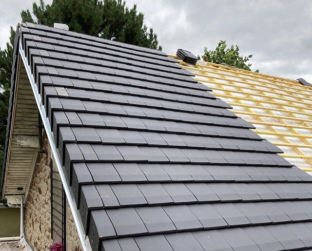 Pose de tuiles plates