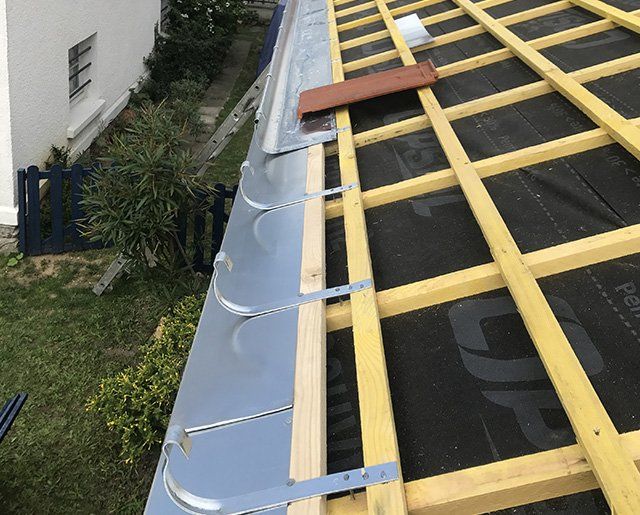 Travaux de zinguerie effectués par l'entreprise de couverture Noirot Toiture