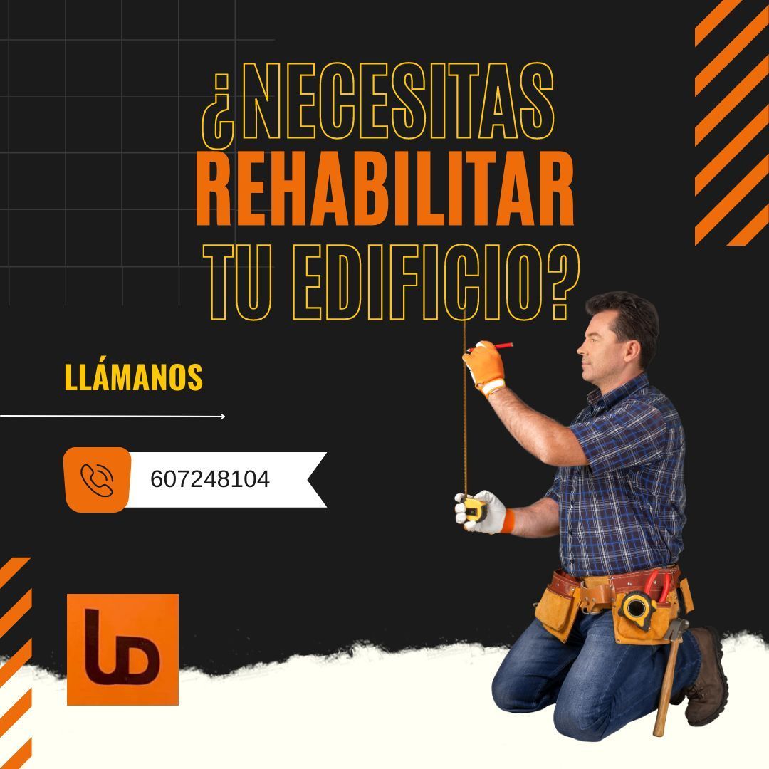 Un hombre está arrodillado sosteniendo una cinta métrica frente a un cartel que dice "Necesitas rehabilitar tu edificio".