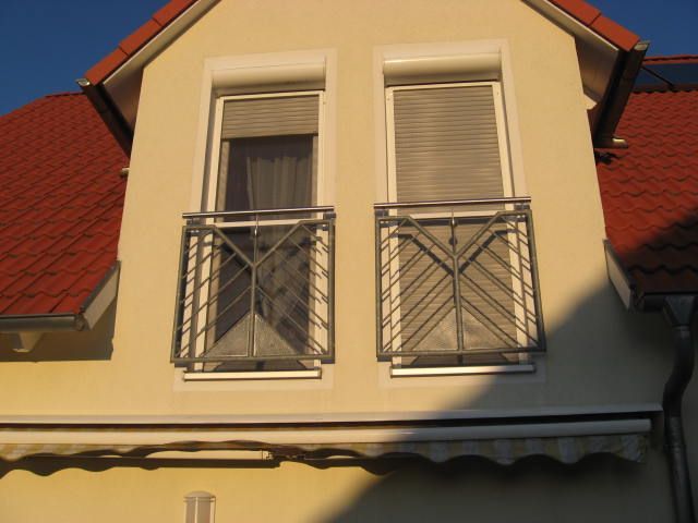 Schutzgitter und Geländer an Terrassentüren in höheren Etagen