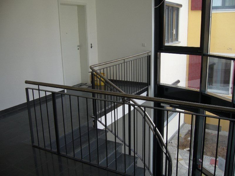 Renovierung eines Flurs mit Wendeltreppe und Geländer