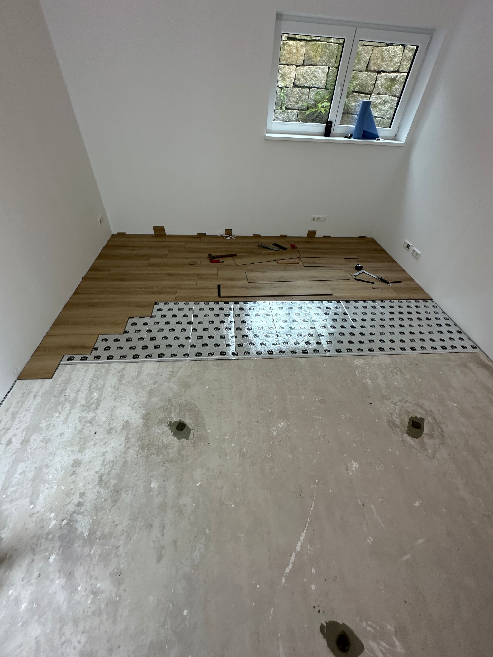 Verlegung von Fußbodenheizung vor Fliesenarbeiten