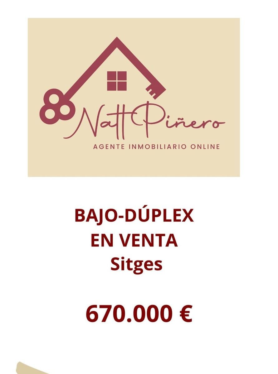 A sign that says ' bajo-duplex en venta sitges ' on it