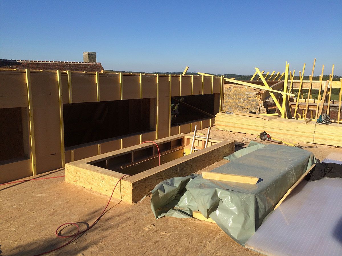 Chantier de construction d'une maison en bois