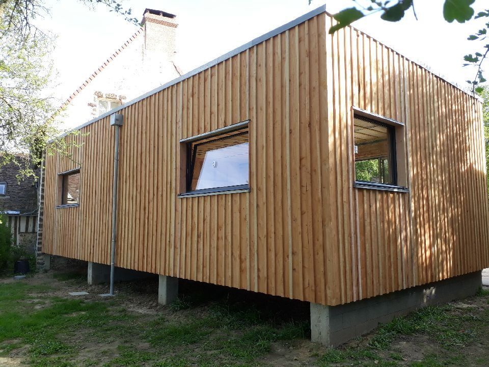 Bardage en bois d'une maison sur pilotis