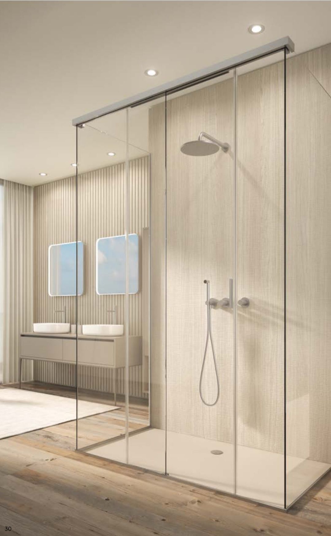 Salle de bains avec paroi de douche en verre