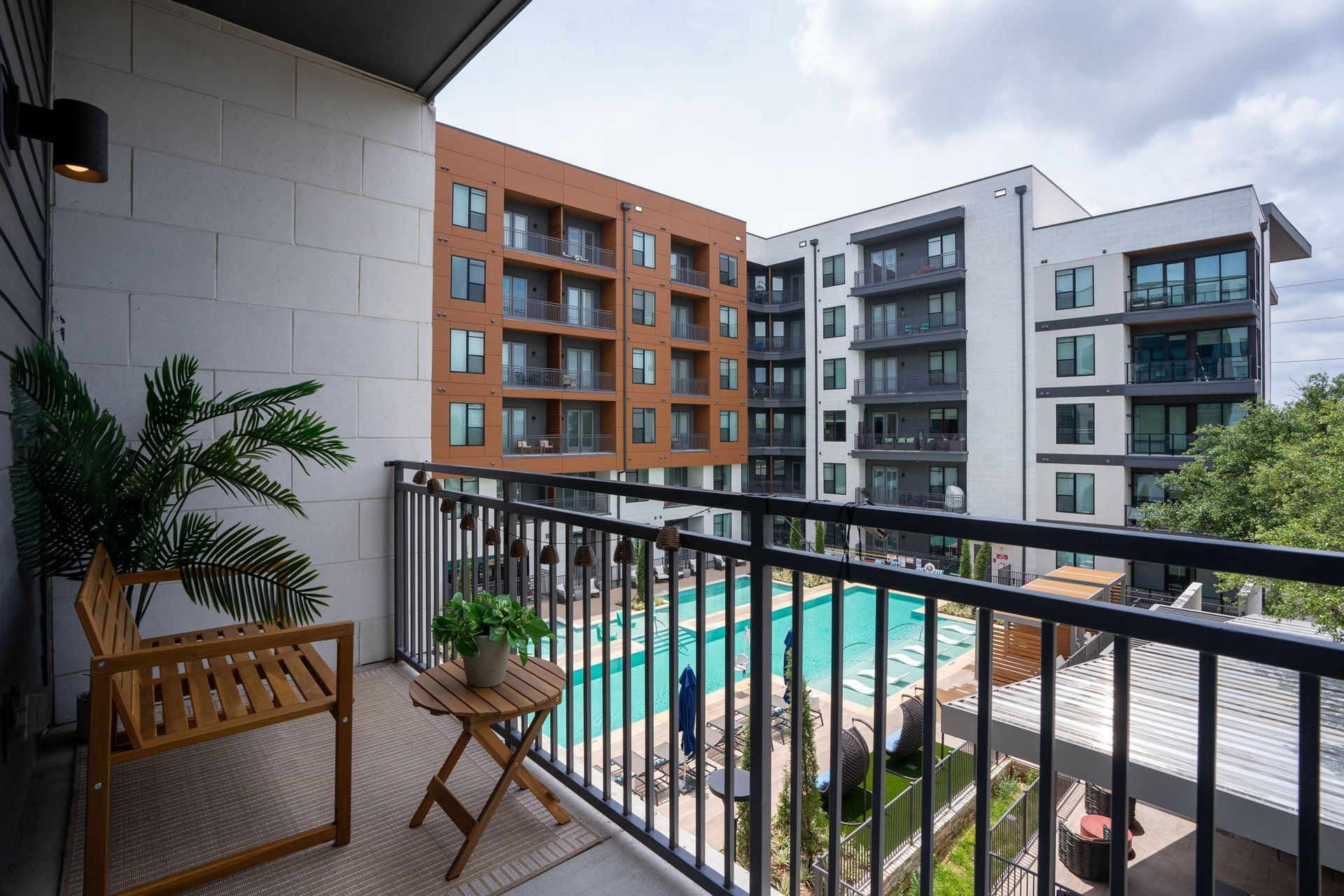 Relax and enjoy the balcony with a pool view from one of our units!