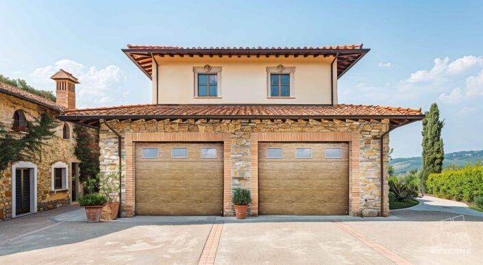 Una grande casa con due garage davanti.