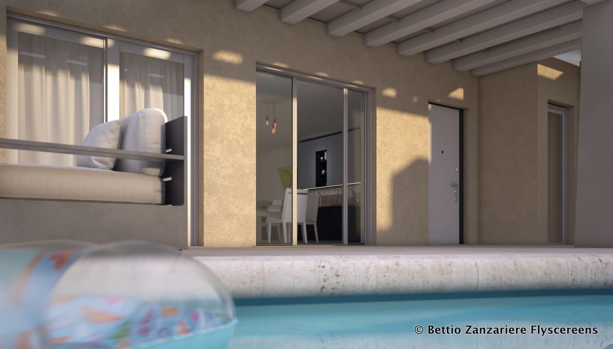 Una piscina con una palla dentro e una casa sullo sfondo