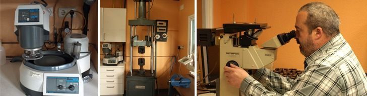 A man in a plaid shirt is looking through a microscope.