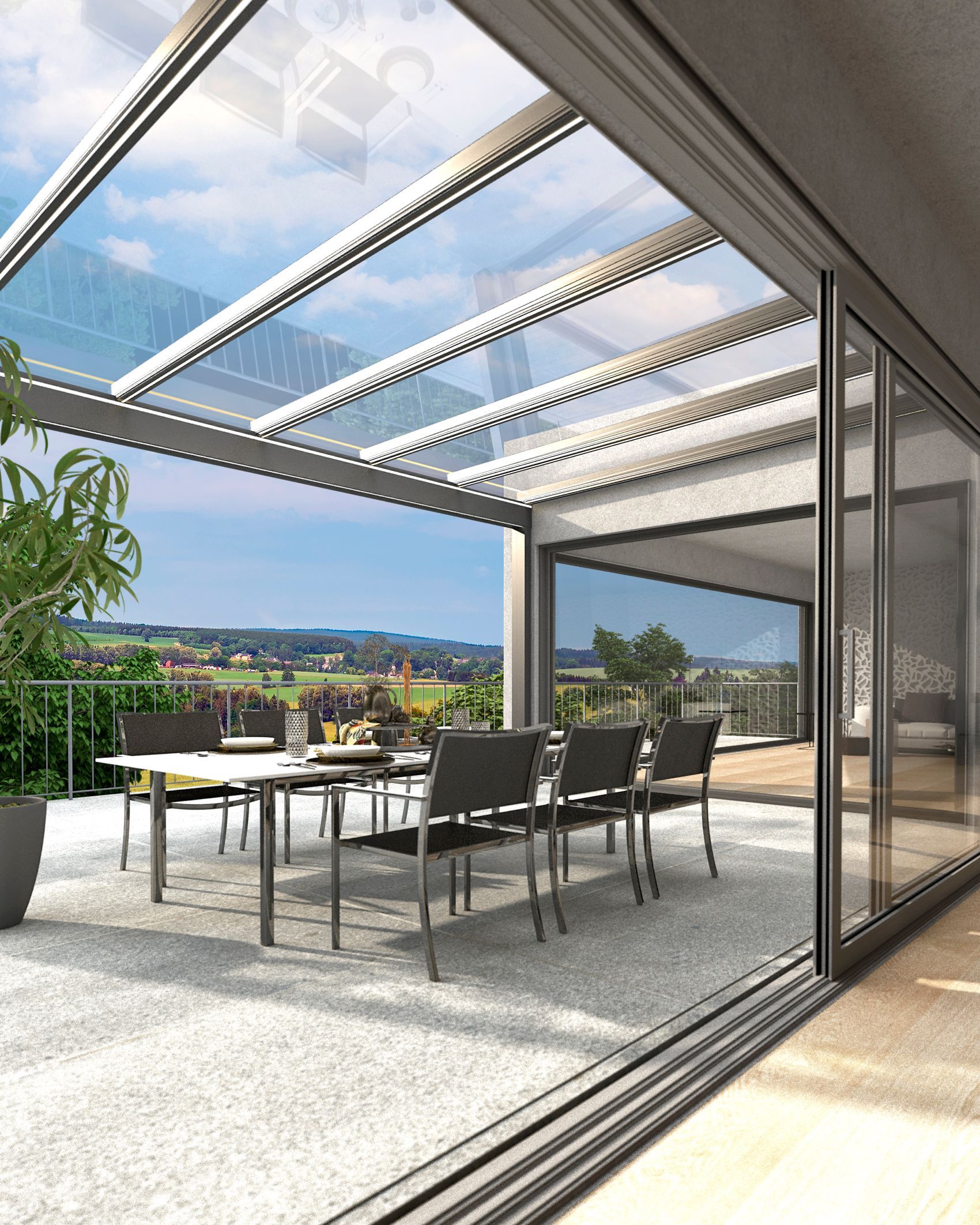 Moderne Terrasse mit Glasdach und Schiebetüren, Essbereich im Freien mit Blick auf die Landschaft.