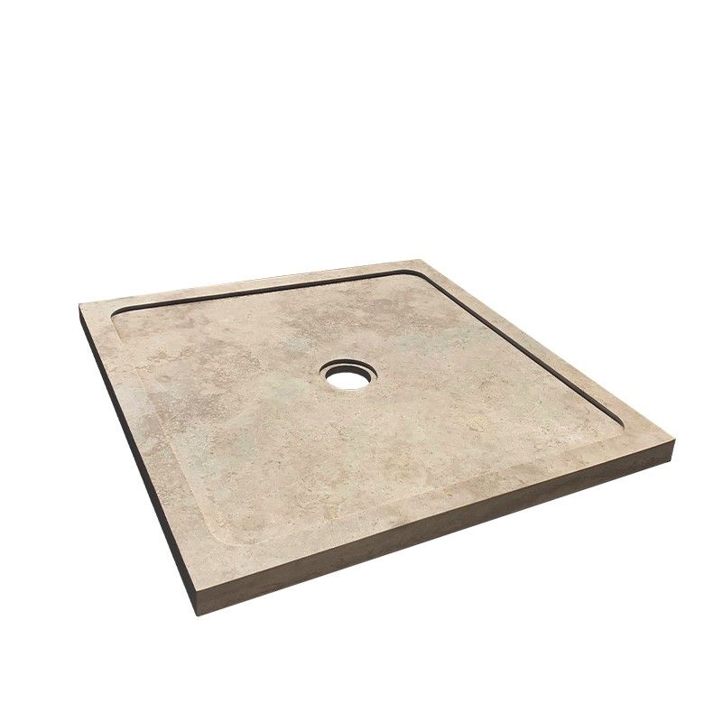 Receveur de douche carré beige avec un trou d'évacuation central et un rebord légèrement surélevé.