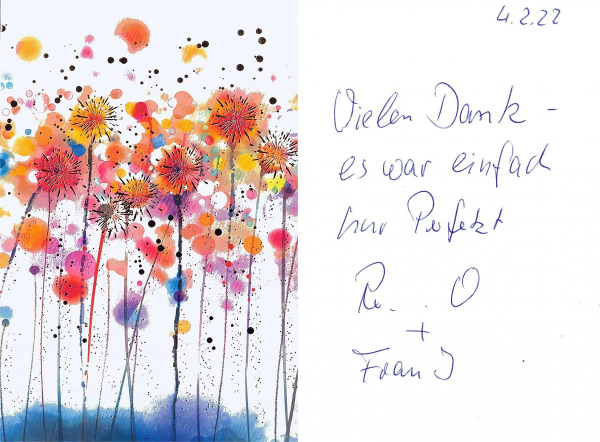 Card with watercolor flowers and handwritten German text: