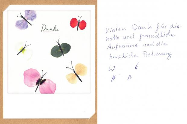 Karte mit Schmetterlingskunst und handschriftlicher Notiz: „Vielen Dank für den freundlichen Empfang und die herzliche Betreuung.“