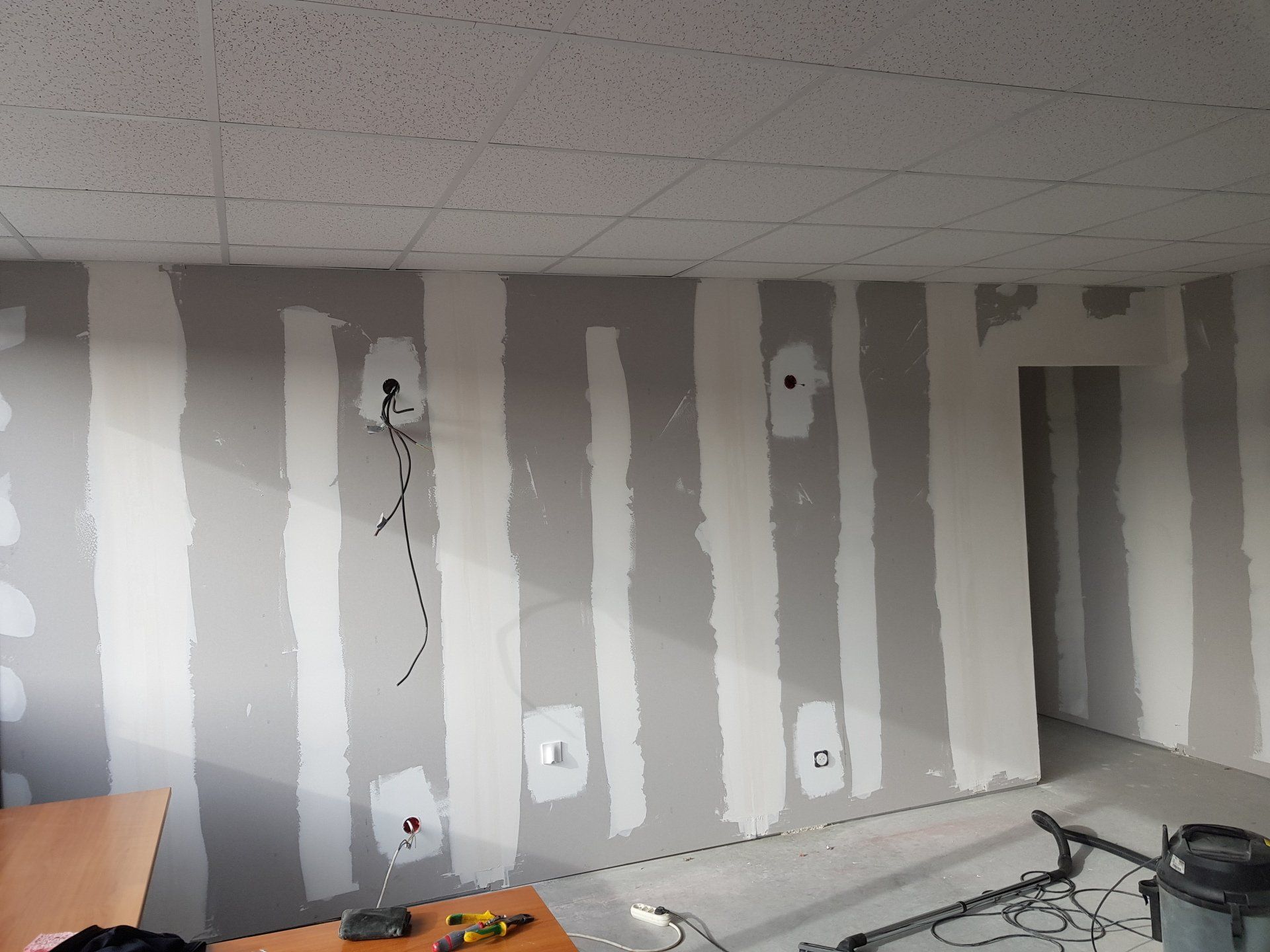 Plâtrerie avec enduit