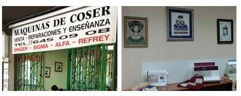 Una máquina de coser está sobre una mesa frente a un cartel que dice máquinas de coser