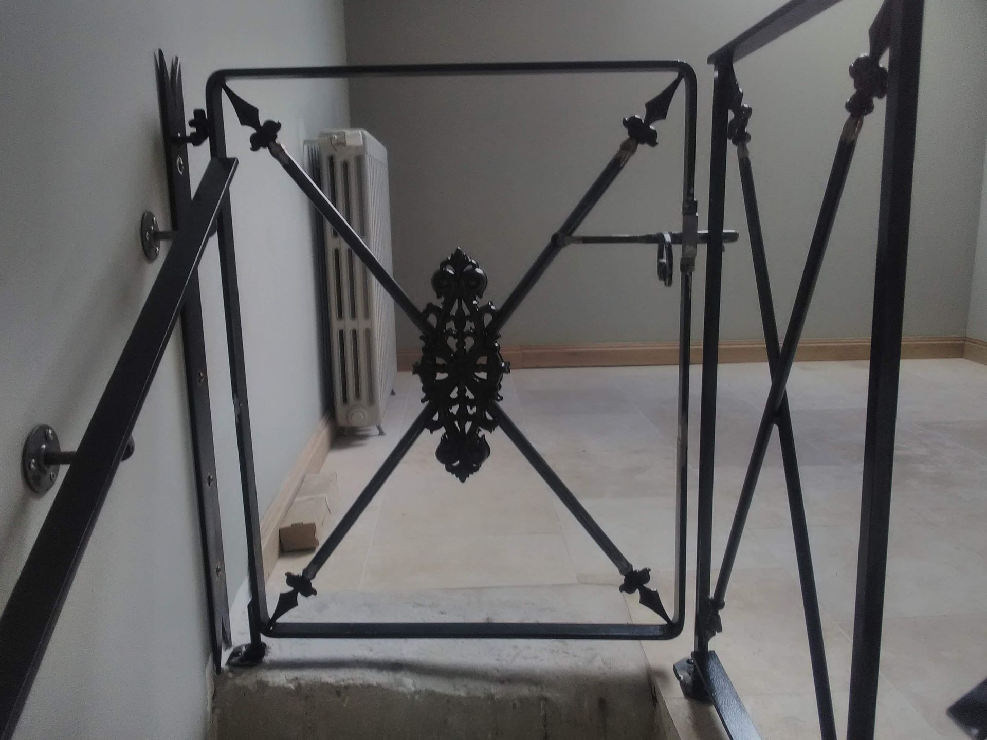 Portillon et rampe en fer forgé