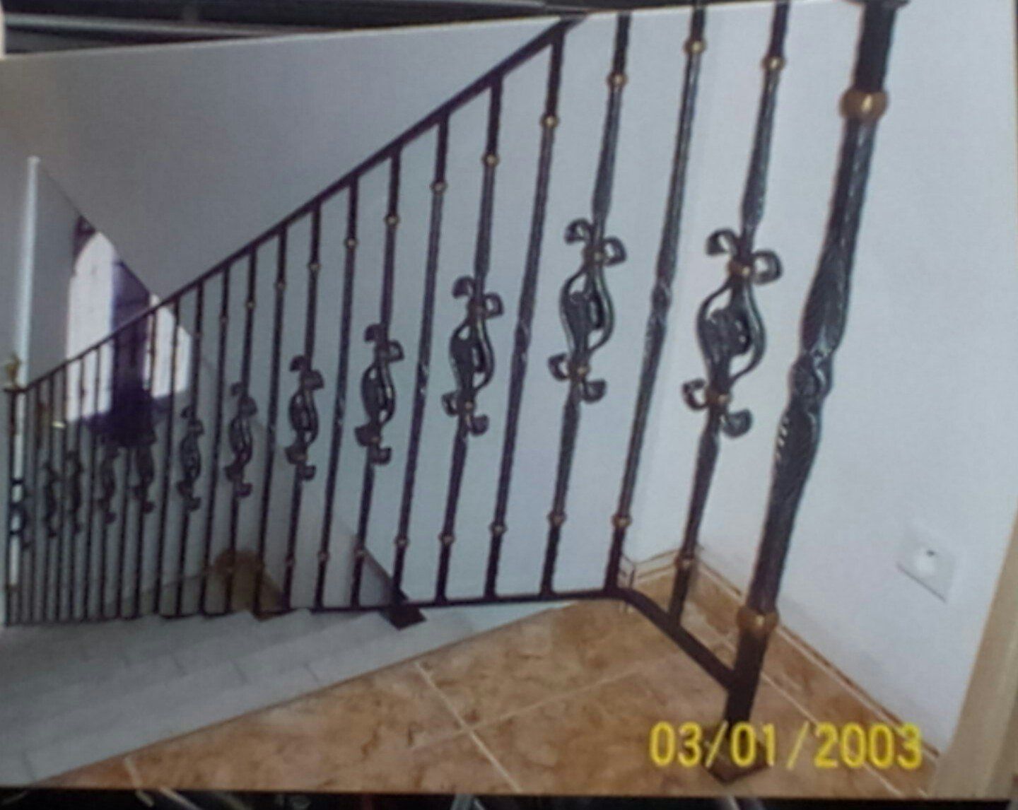 Rampe d'escalier avec des éléments décoratifs