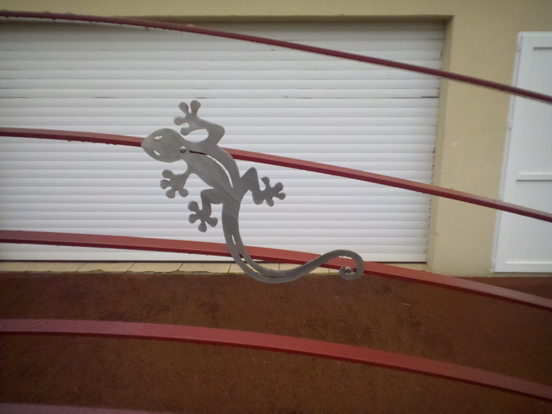 Élément décoratif pour portail, salamandre