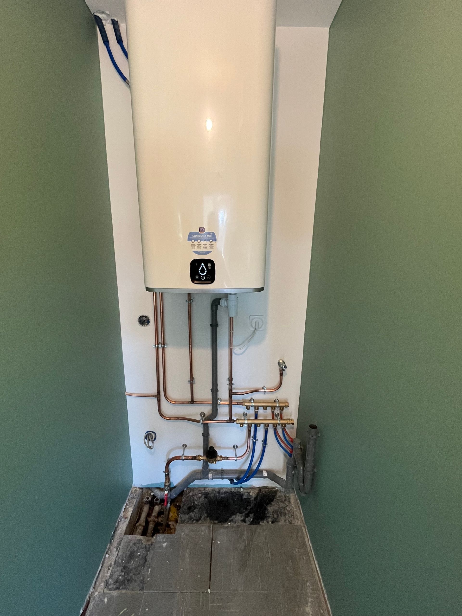 Installation et raccordement d'une chaudière au gaz murale