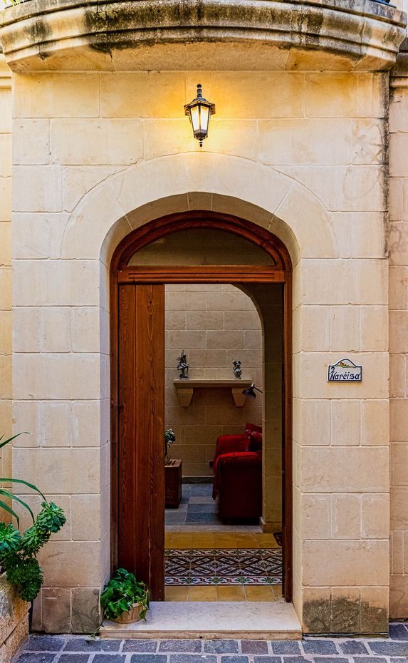 Rustic stone entrance door at Narcisa LeVecca farmhouse, Ghasri, Gozo