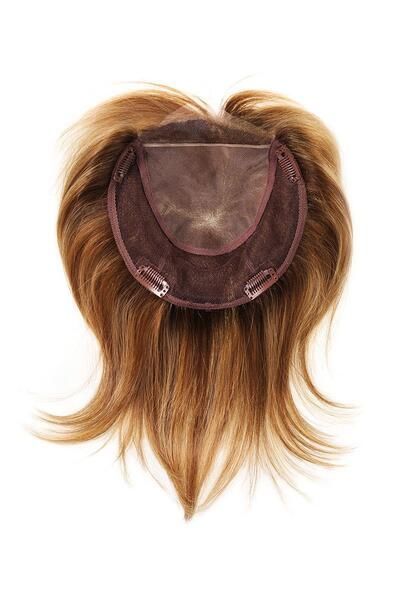 Eine Nahaufnahme einer Perücke auf weißem Hintergrund.