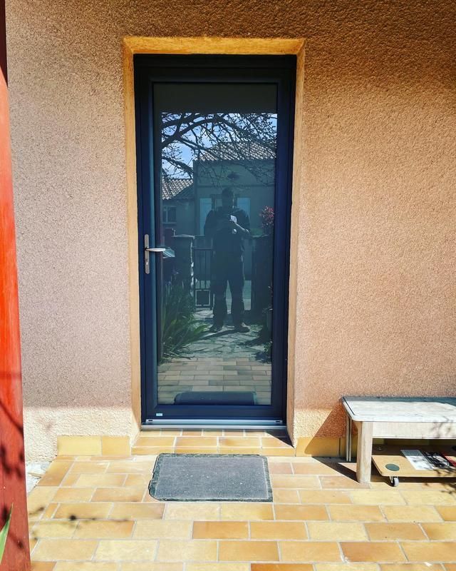 Porte d'entrée en verre