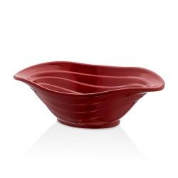 Cuenco para servir de cerámica de color rojo con diseño en espiral.