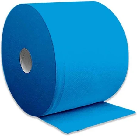 Rollo de papel azul desenrollándose sobre una superficie plana.