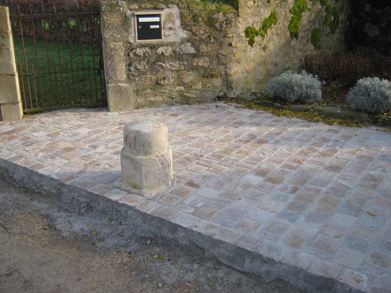 Pose de pavé devant un parc