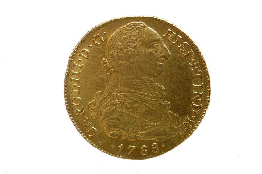Una moneda de oro con el año 1766