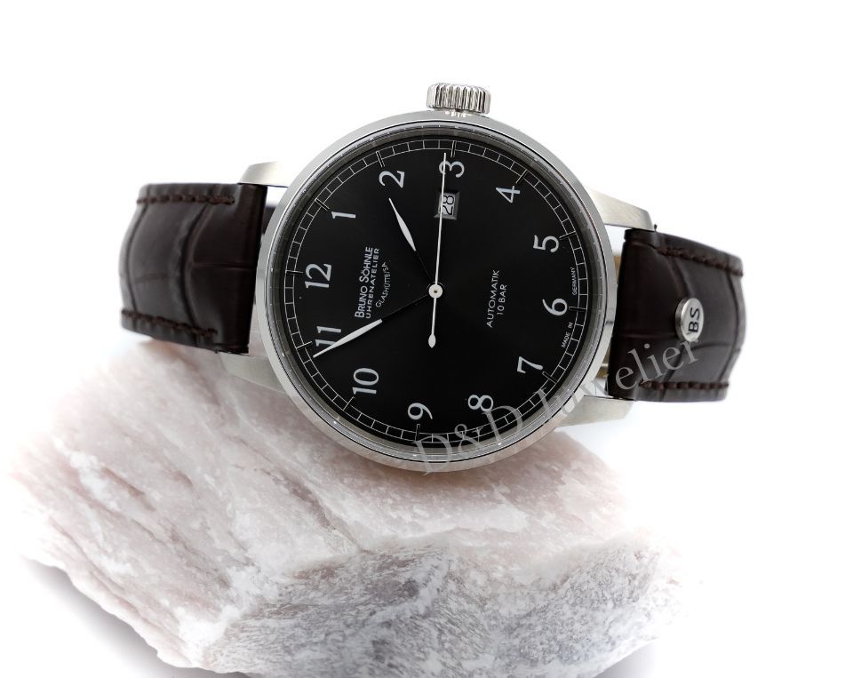 Elegante Armbanduhr mit Lederarmband und dunklem Zifferblatt