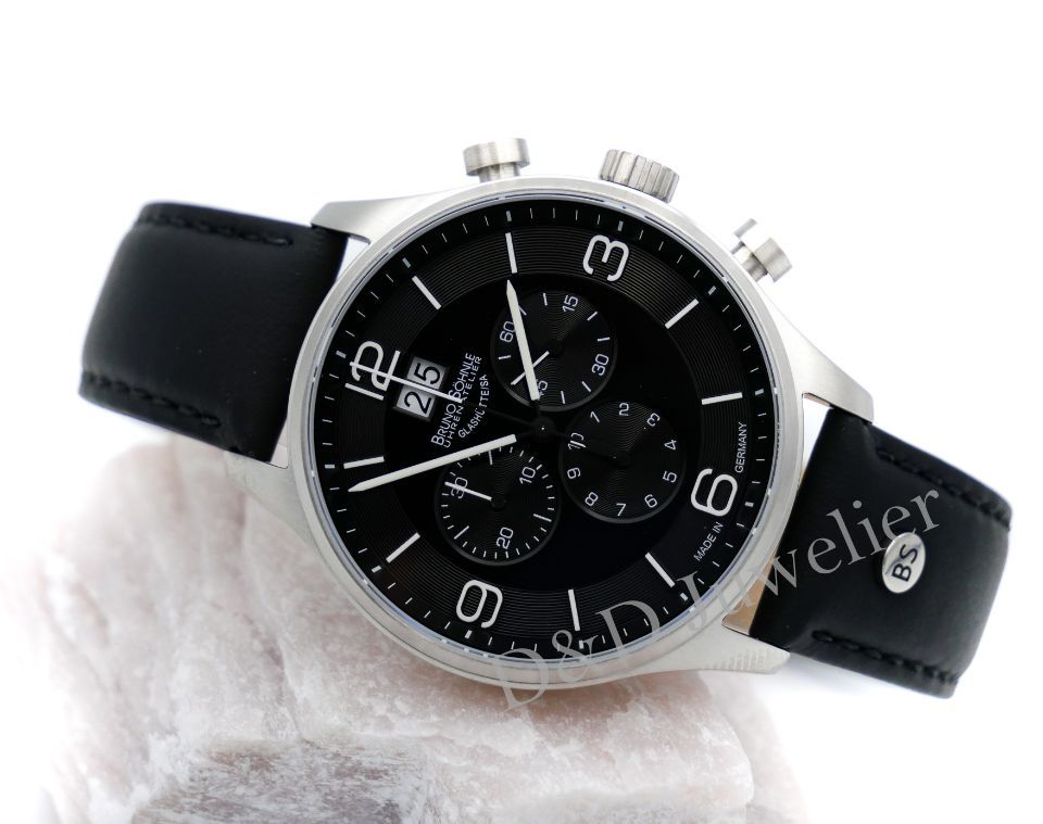 Elegante Armbanduhr mit Lederarmband und dunklem Zifferblatt