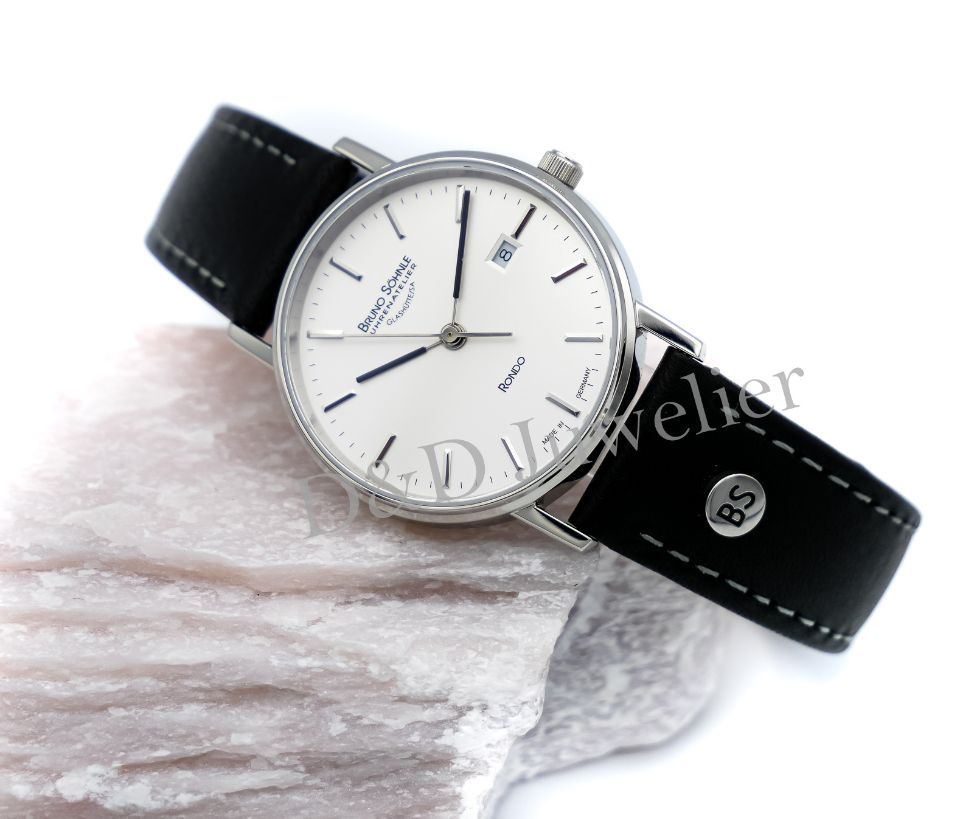 Elegante Uhr mit Lederarmband und hellem Zifferblatt