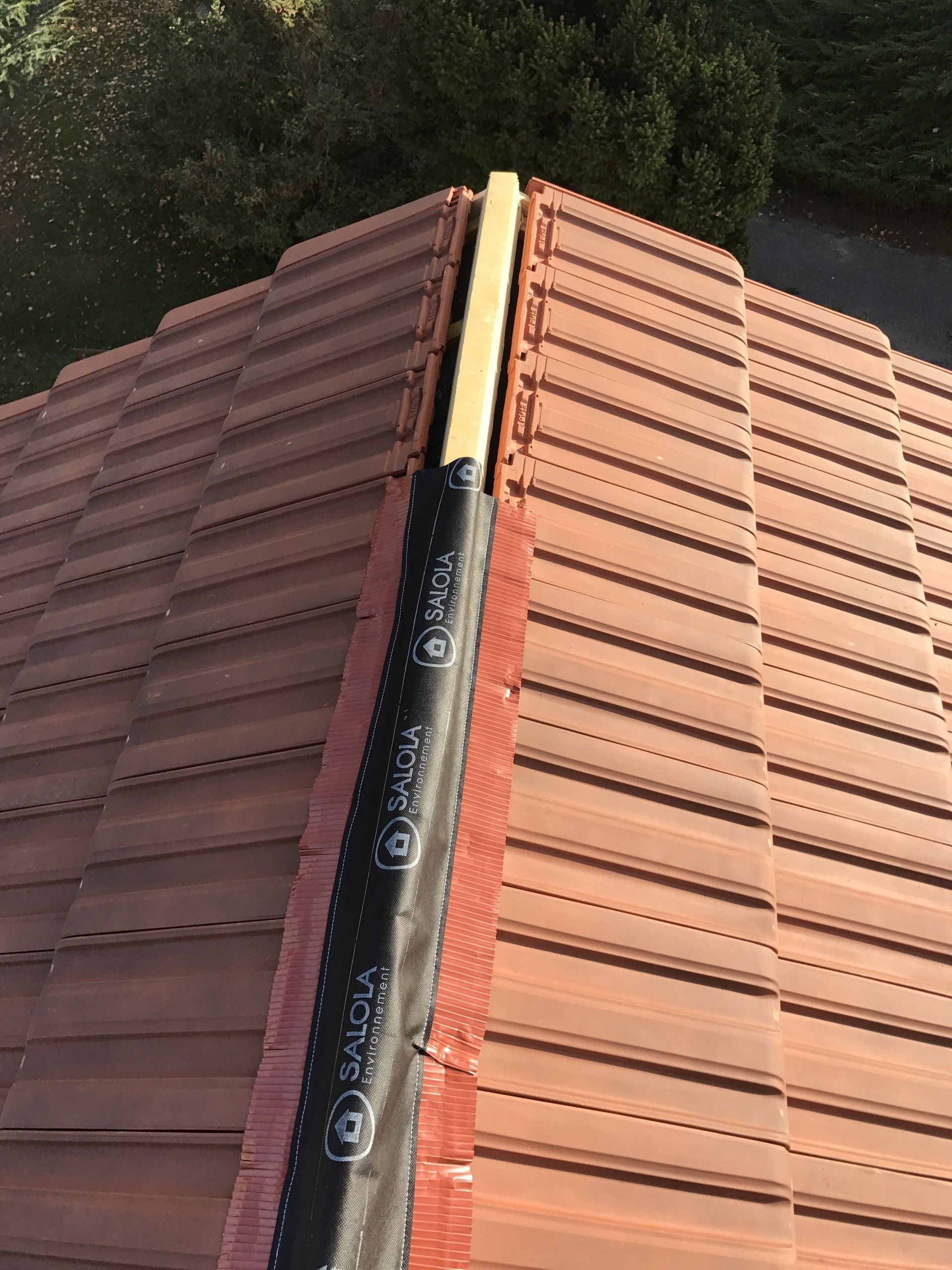 Pose de zinguerie sur toiture neuve