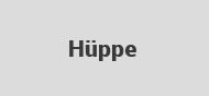 Das Wort „Huppe“ ist in schwarzer Schrift auf weißem Grund geschrieben.