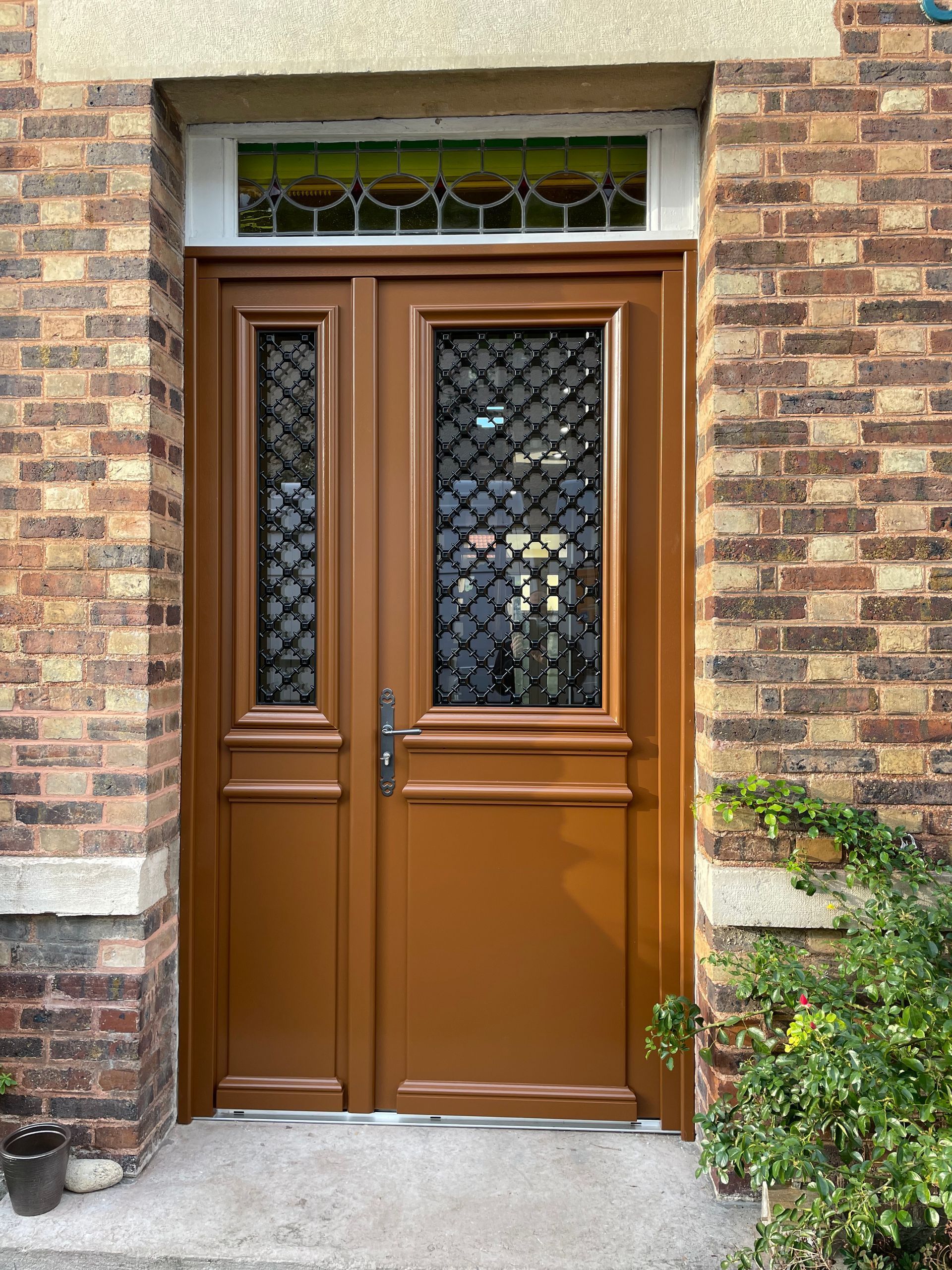 Porte d'entrée vitrée en bois