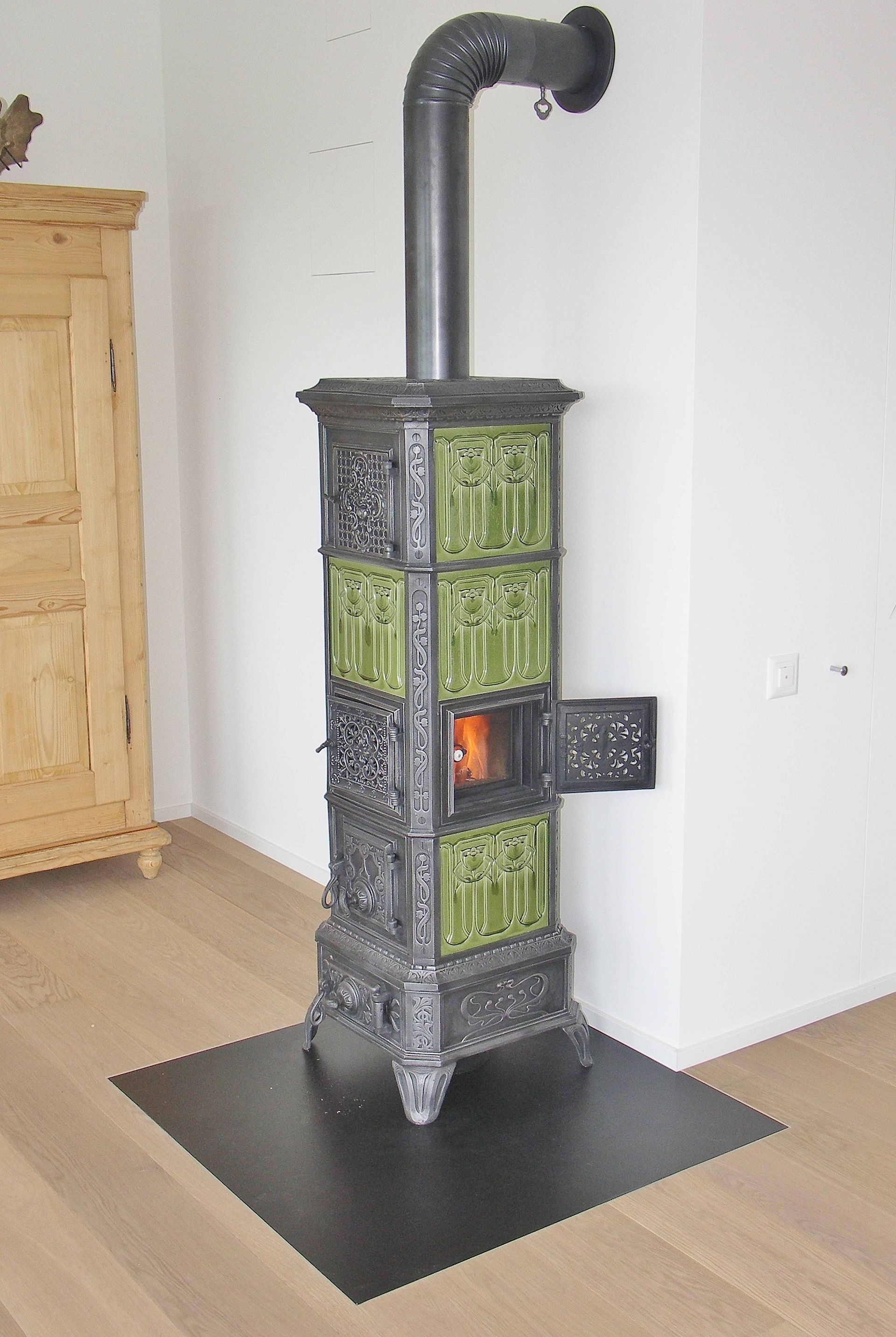 Stove with additional loading door including glass door on right-hand side