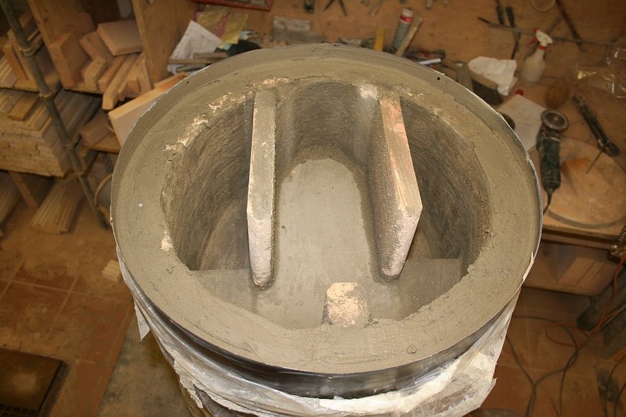 Conduits de fumées à l’intérieur d’un poêle cylindrique