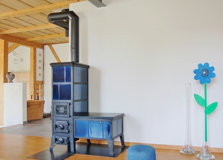 Klus-Kachelofen mit Sitzbank ca. 1920