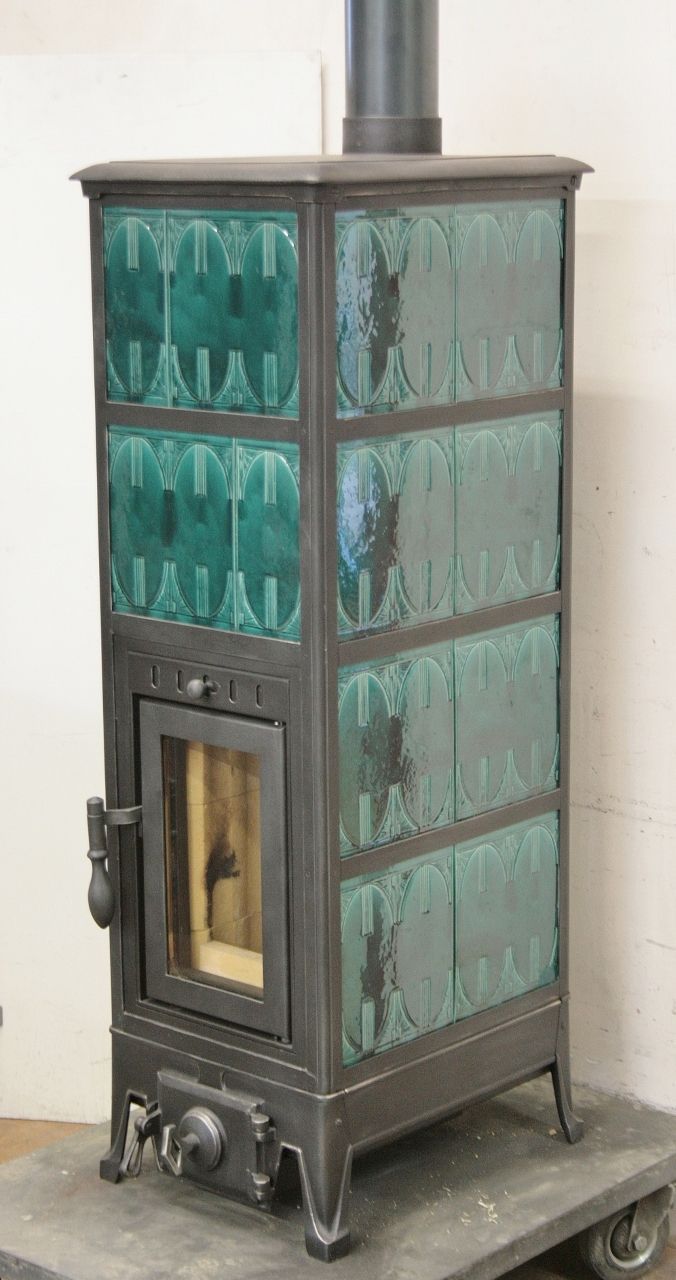 Patent combustion chamber 2015 in an antique stove with max. efficiency over 82%