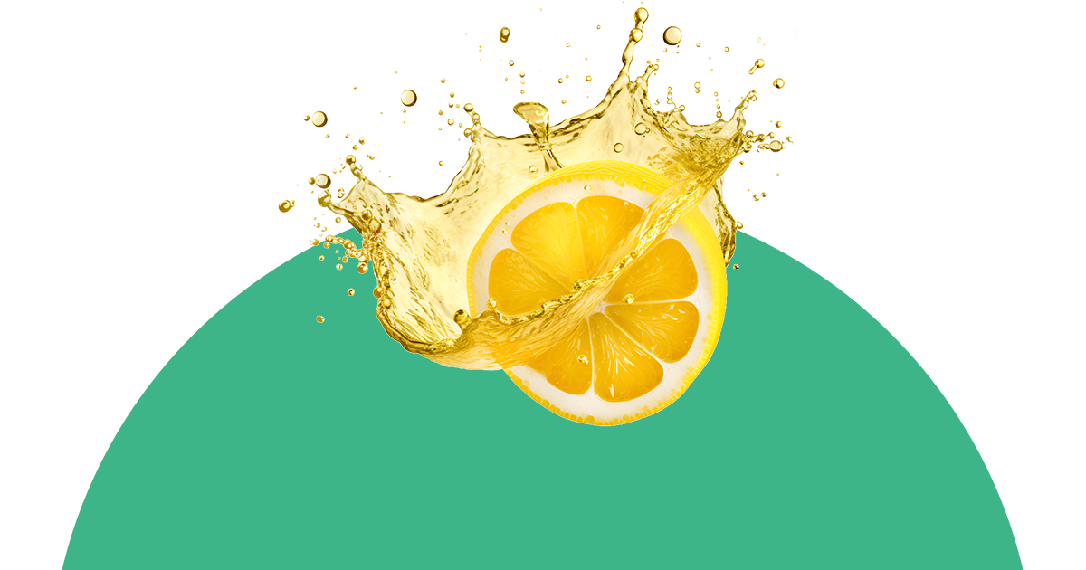 Eine Zitronenscheibe spritzt in einen grünen Kreis.